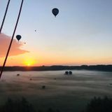 Prachtige zonsopkomst tijdens onze ballonvaart.